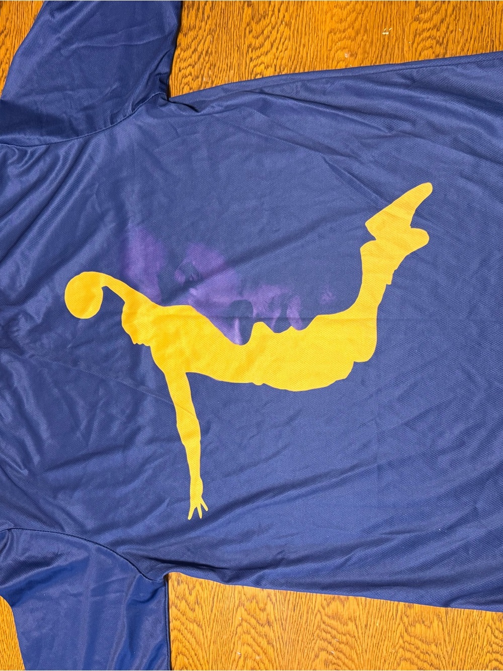 Blue Graphic Top with Yellow Acrobat Silhouette